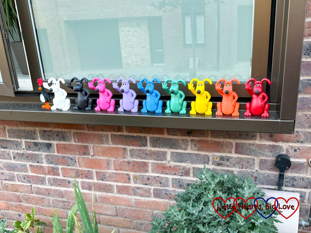 A row of miniature Gromits in all the colours of the rainbow