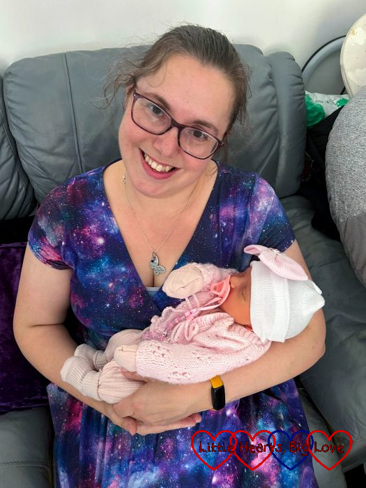 Me cuddling my new great-niece