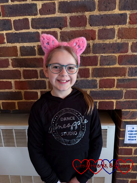 Sophie wearing her new glasses
