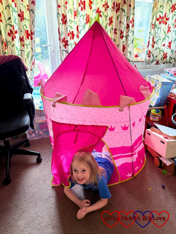 Thomas looking out of the pop-up tent