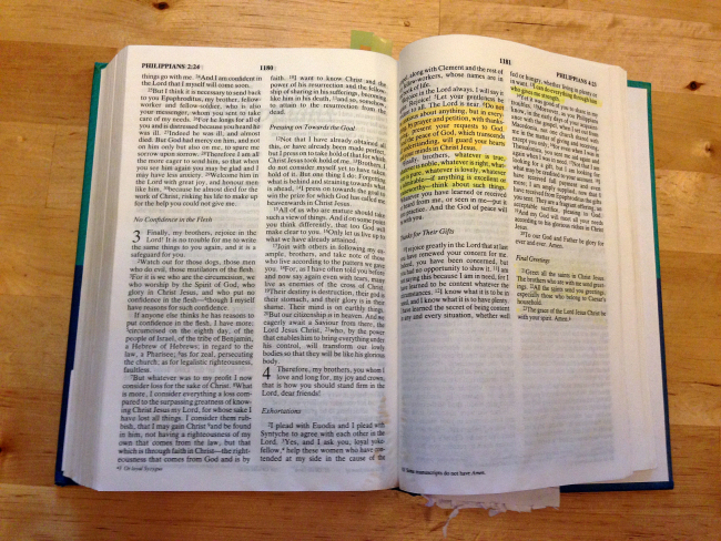 An open Bible with Philippian 4:13 highlighted
