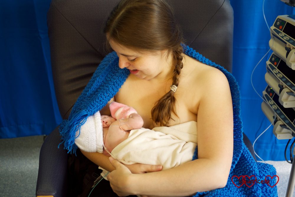 Me breastfeeding Jessica on PICU