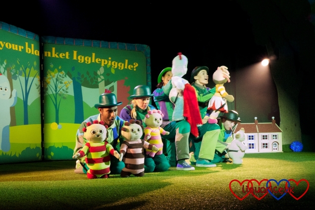 The In the Night Garden performers holding the various characters