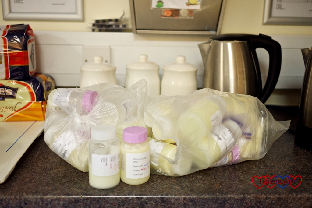 A bag of little bottles of frozen expressed breastmilk
