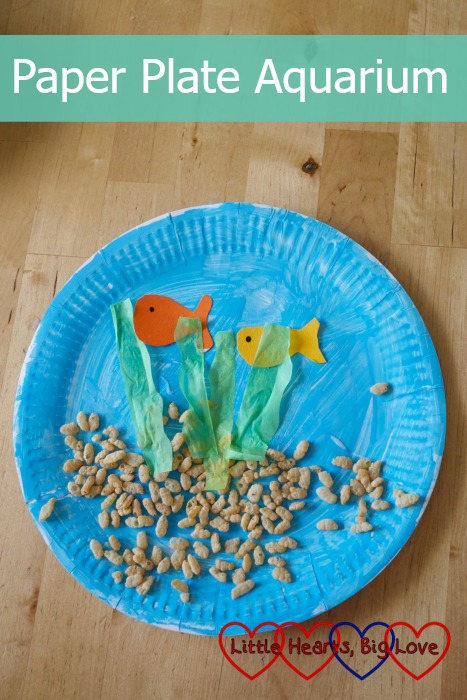 A Paper Plate Aquarium made with rice krispies, with cardboard fish and tissue paper plants