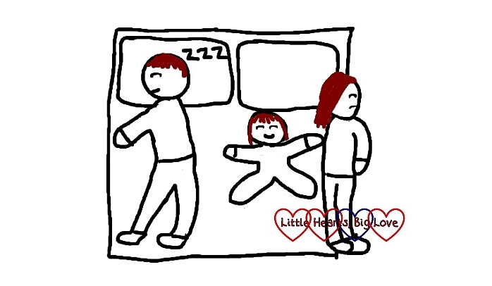 A cartoon of a baby asleep between their parents with the mum falling off the edge of the bed