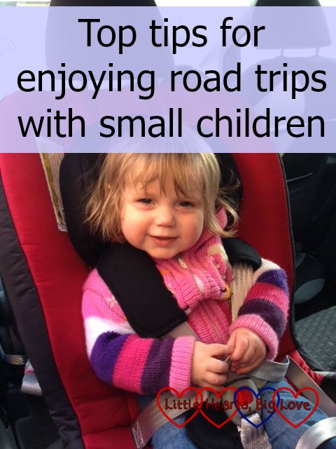 Sophie sitting in her car seat - "Top tips for enjoying road trips with small children"