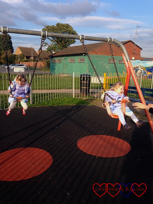 Fun on the swings - Birthday fun at the park - Little Hearts, Big Love