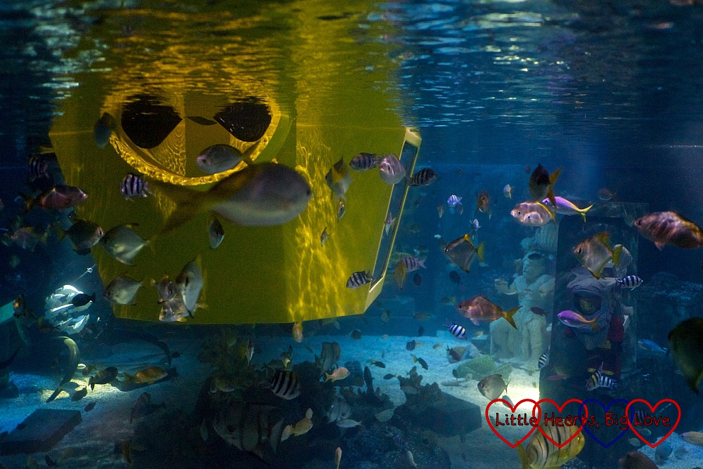 A yellow submarine and fish on the Atlantis Submarine Voyage ride at Legoland