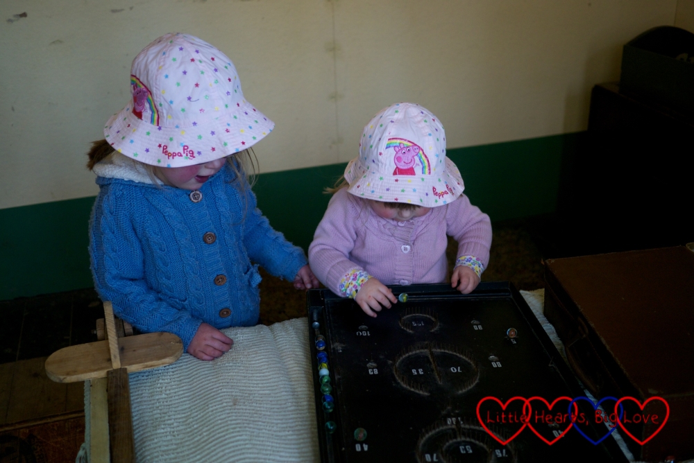 Playing pinball in the Amersham prefab - Easter fun at Chiltern Open Air Museum - Little Hearts, Big Love