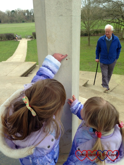 Spotting a ladybird on one of the columns of the Magna Carta memorial