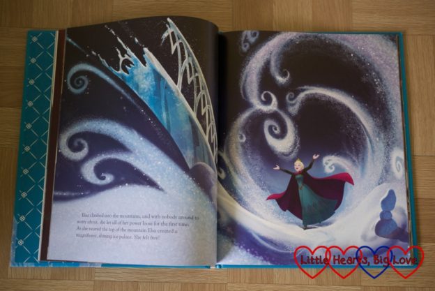 The iconic scene from Frozen where Elsa lets it go shown in the book from Parragon Book's Disney Movies Collection