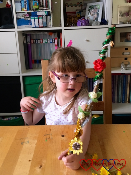 Jessica with her sparkly fairy wand made from a stick, sparkly pipe cleaners and paper flowers