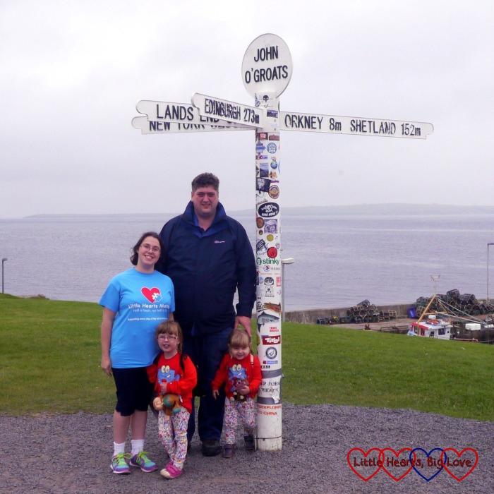 Me, hubby, Jessica and Sophie standing in front of the signpost at John O'Groats