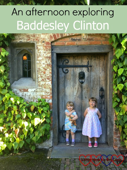 The girls in front of a door in the inner courtyard at Baddesley Clinton