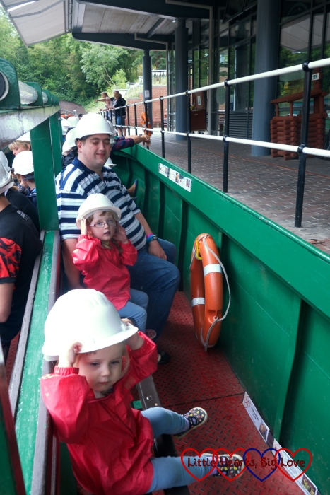 Hubby and the girls sitting on the boat ready to go into the Dudley tunnel