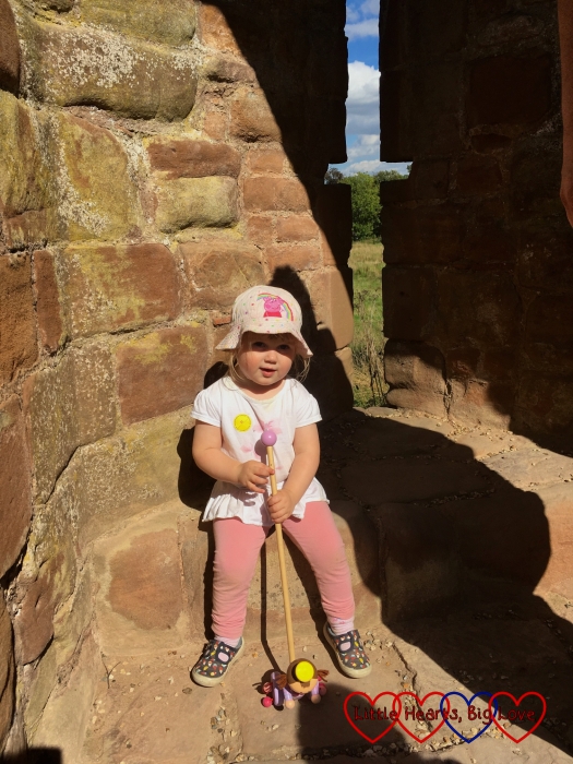 Sophie sitting in an alcove in the castle