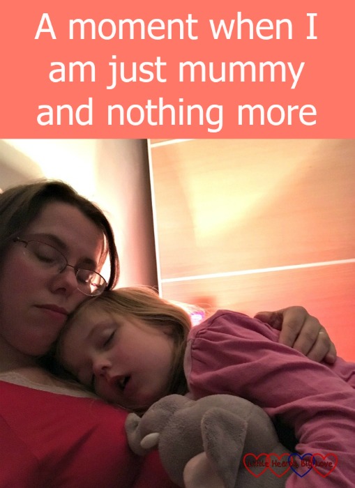 Me sitting in bed with Jessica asleep on my chest and the text "A moment when I am just mummy and nothing more"