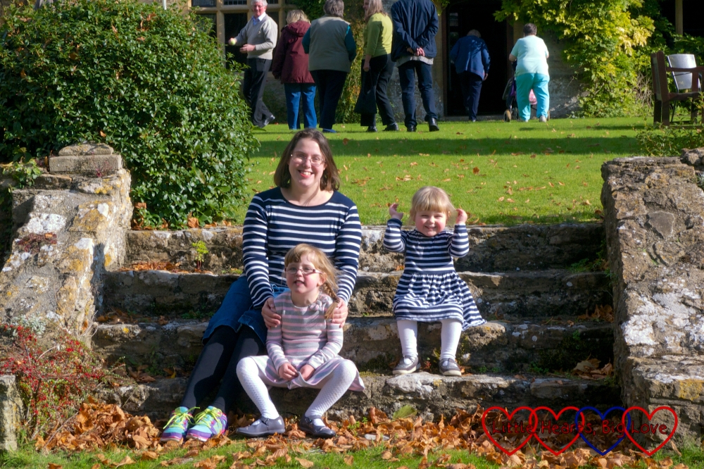 Me and my girls sitting on the steps outside Charney Manor