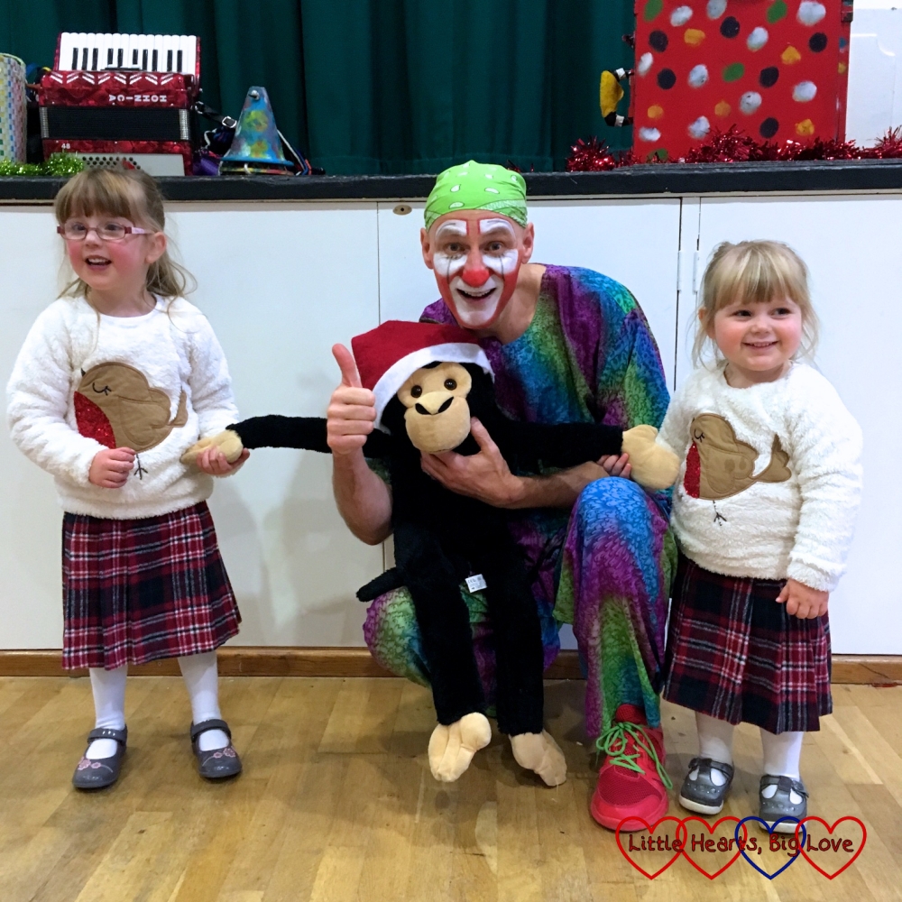 Jessica, Sophie and Monty the monkey with Scotty the clown