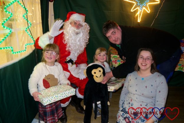 Me, hubby, Jessica, Sophie and Monty with Father Christmas
