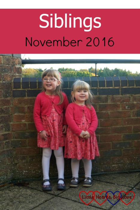 Jessica and Sophie in matching pink dresses and cardigans - Siblings November 2016