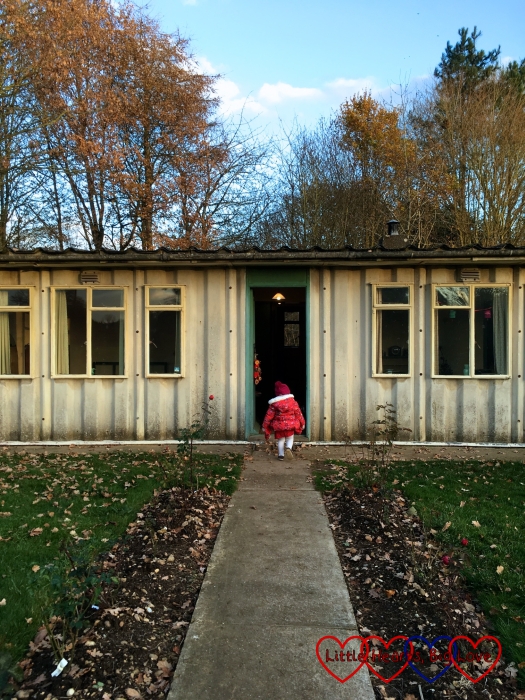 Sophie heading into the "playing house" - otherwise known as the Amersham prefab