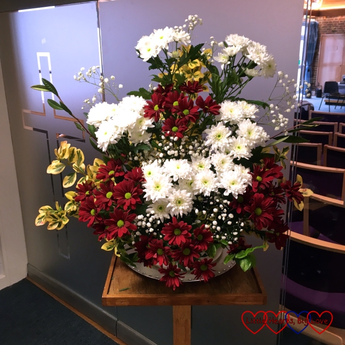 My first flower arrangement at church - red and white chrysanthamums in memory of my dad