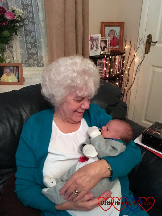 My mum having a cuddle with her newest great-grandson