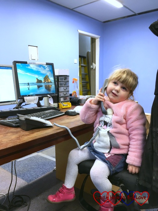 Sophie on the phone in Daddy's office