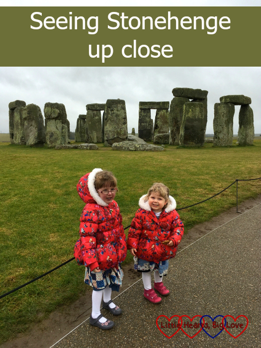 Jessica and Sophie standing near the stones at Stonehenge