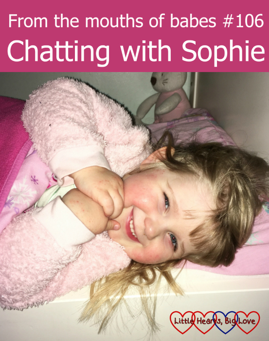 A smiley Sophie snuggled up in bed: From the mouths of babes #106 - Chatting with Sophie