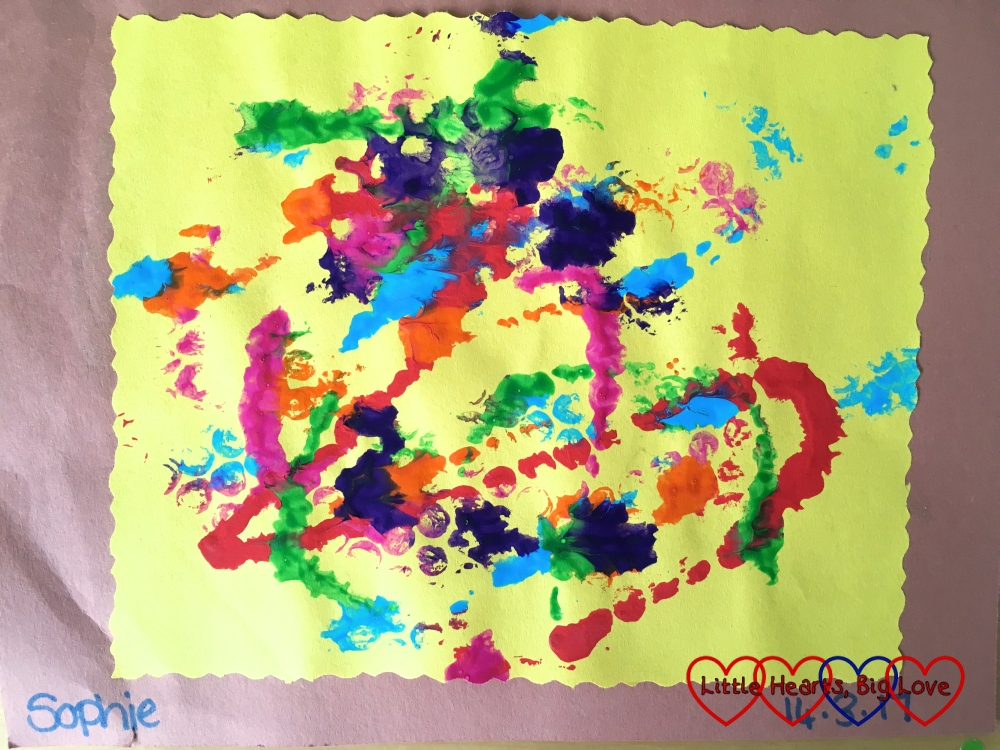 Sophie's painting that she did at preschool - "dots and splashes of paint"