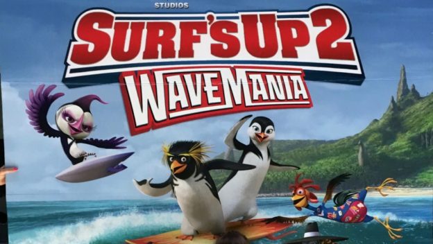 Part of the Surf's Up 2: Wavemania poster showing the title and some of the surfing penguins