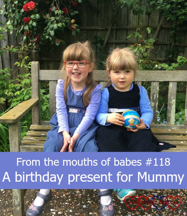 Jessica and Sophie sitting on a bench - "From the mouths of babes #118 - A birthday present for Mummy"