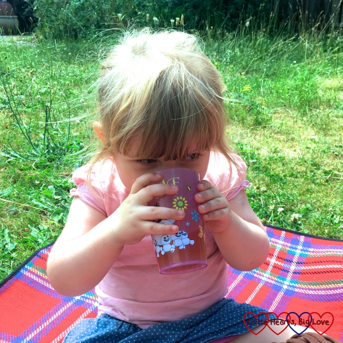 Sophie enjoying a glass of home-made cherry lemonade