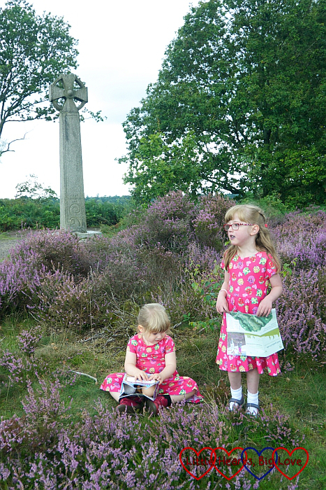 Jessica and Sophie amongst the heather near the Celtic Cross