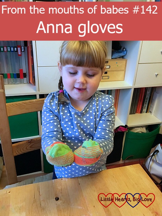 Sophie wearing socks on her hands - "From the mouths of babes #142 - Anna gloves"