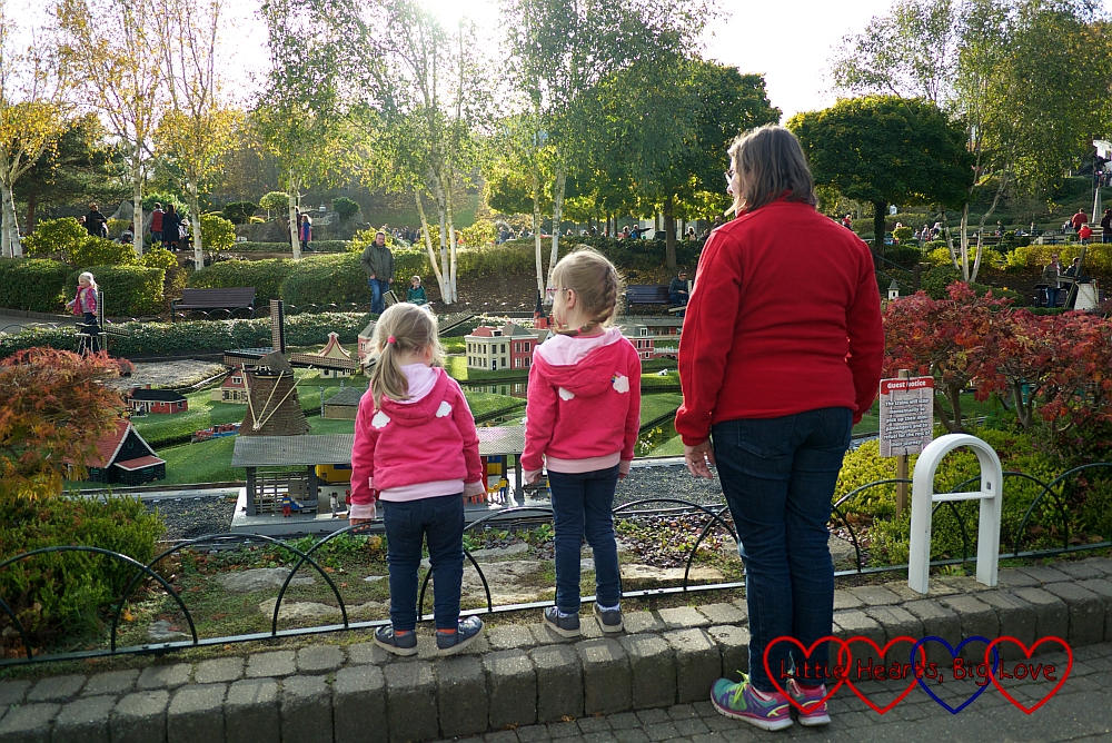 Me, Jessica and Sophie watching the train going round in the Holland part of Miniland