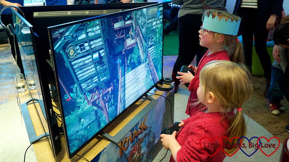 Sophie and Jessica playing Knack 2 on the PS4 at the PlayStation Kids and Parenting Showcase