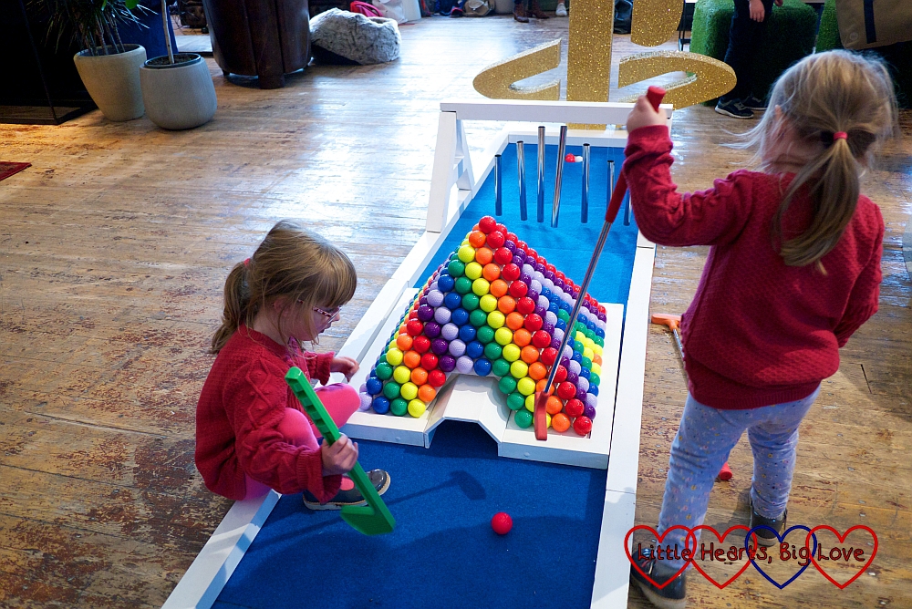 Sophie and Jessica playing crazy golf at the PlayStation Kids and Parenting Showcase