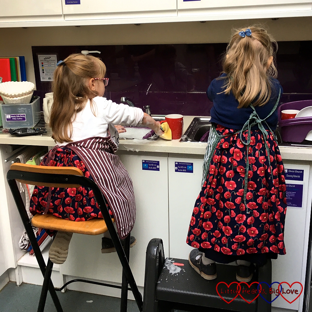 Jessica and Sophie doing the washing up at church