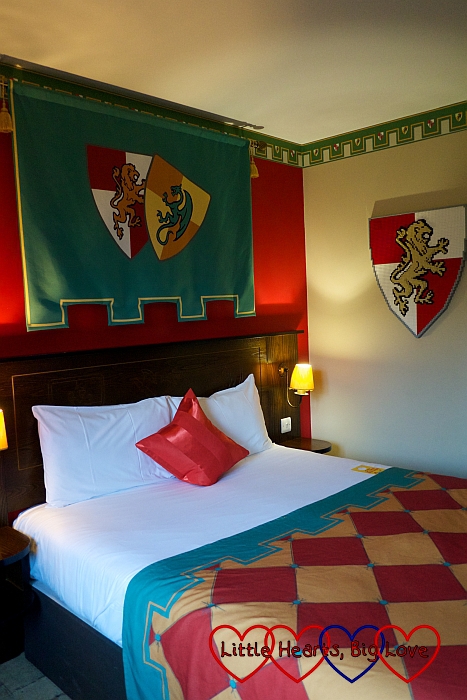 The double bed in the adult sleeping area in a Kingdom themed room at the Legoland Hotel