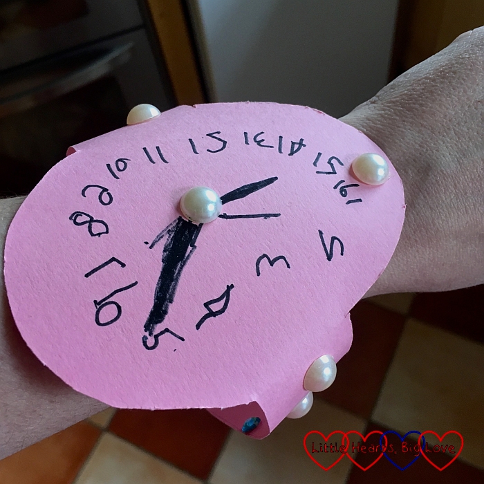 The watch Jessica made me for Mothers' Day with "pearl" buttons and a clock face that goes up to 16 o'clock