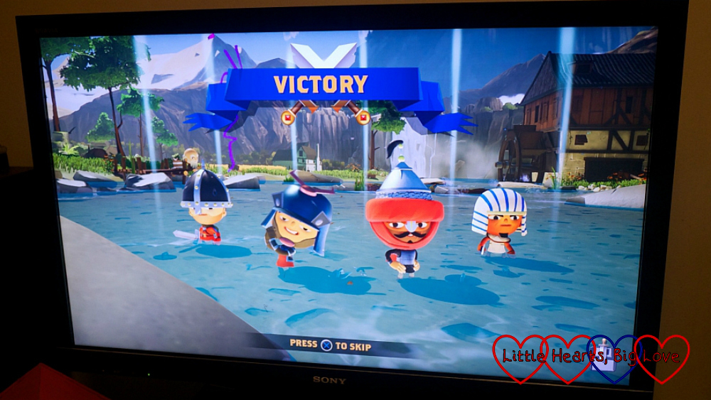 A screenshot from World of Warriors with victory for the player's two warriors in battle mode