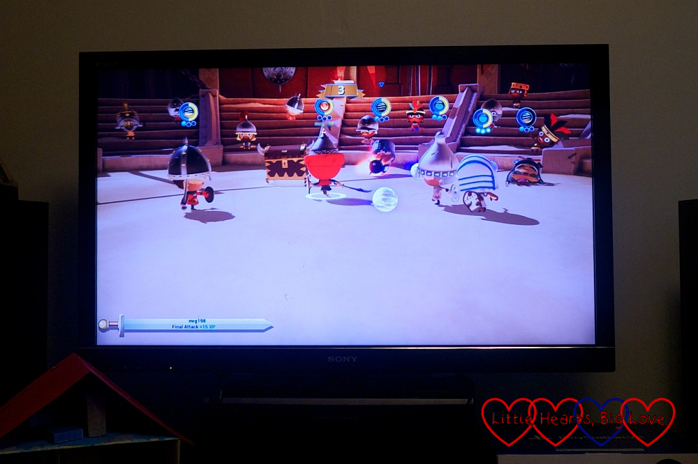 Screenshot from World of Warriors with the player battling several other warriors