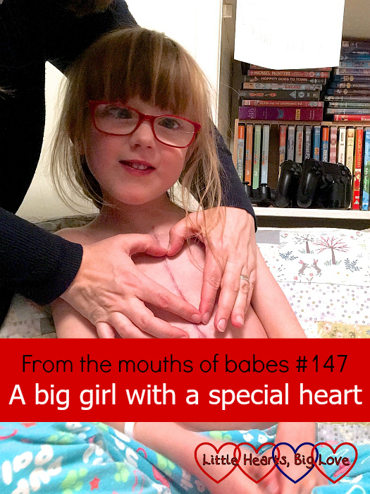 Jessica with my hands making a heart shape around her "zip" - "From the mouths of babes #147 - "A big girl with a special heart"