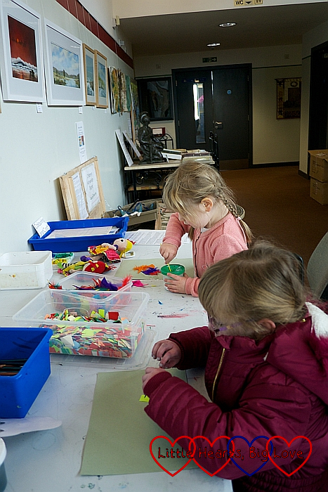 Jessica and Sophie doing crafts at Brading Roman Villa