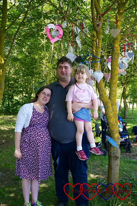 Me, hubby and Sophie at the National Memorial Arboretum underneath the heart we hung in the tree for Jessica