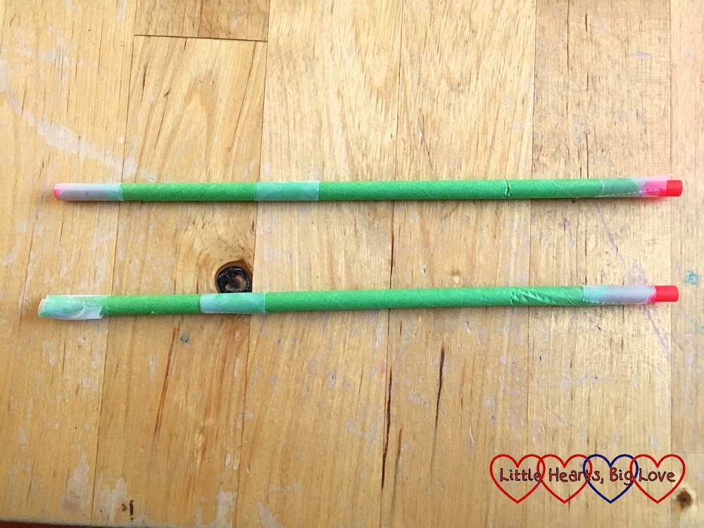 Green tissue paper-covered straws